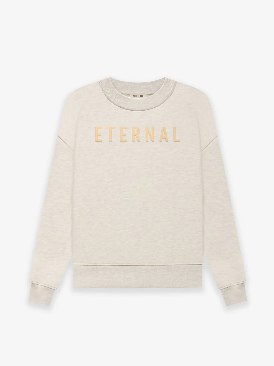 FGE50-003AFLC_ETERNAL_FLEECE_CREWNECK_WARM_HEATHER_OATMEAL-Front_900x.webp FEAR OF GOD Fleece Crewneck - Image 1